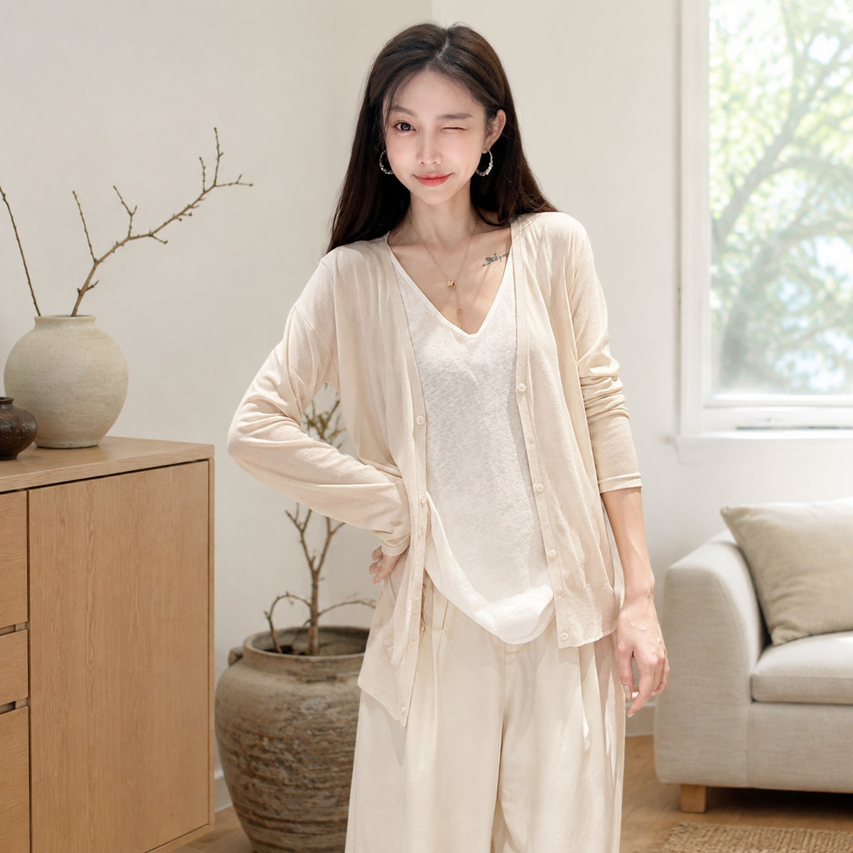 Fine-knit cardigan styled as a light layer